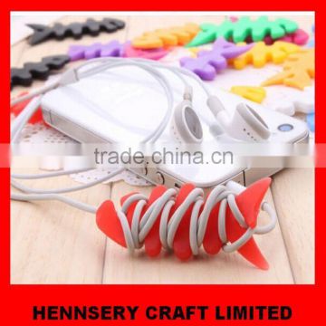customized shape and logo soft pvc rubber earphone cable cord holder clip