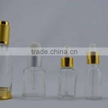 clear glass oil bottle with golden cap glass water bottle cosmetic glass bottle