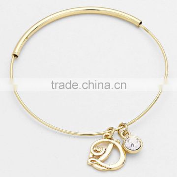 Gold tone initial letter bracelet