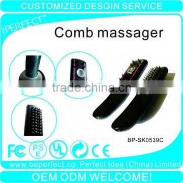 Electronic vibration comb massager