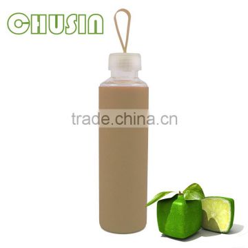 wholesale glass water bottle with 100% food grade silicone sleeve and PP lid and straw
