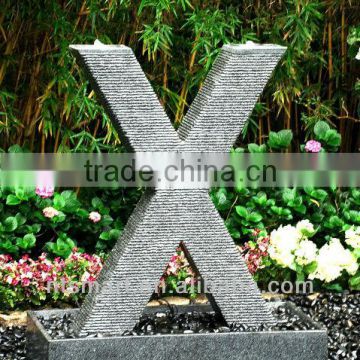 granite letter fountain X