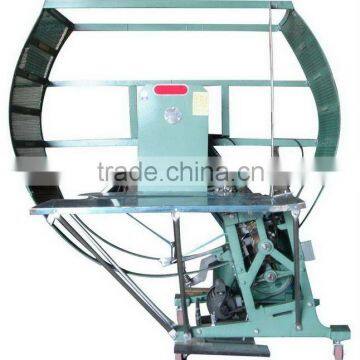 The corrugated carton box strapping machine