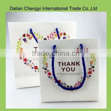 Manufacturer wholesale green handled foldable paper shopping bag