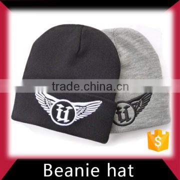 Knitted beanie hat with two balls in low price