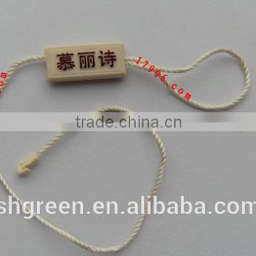 Plastic embossed character string lock tag/hang granule