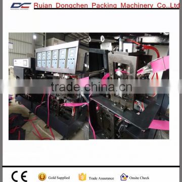 Automatic soft handles fixing machine for Non woven shopping bag at one time