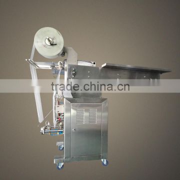 Automatic tip bucket triangle food packing machine