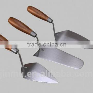 Plastering trowel with wooden handle