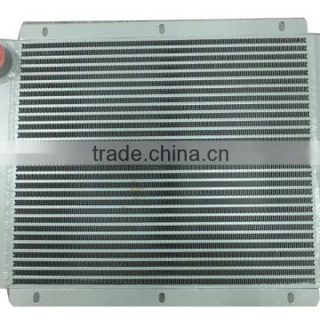 Custom copper plate bar heat exchanger for agricultural vehicles
