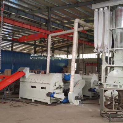 Separating and recycling machine for defective diapers, sanitary napkins and leftover materials