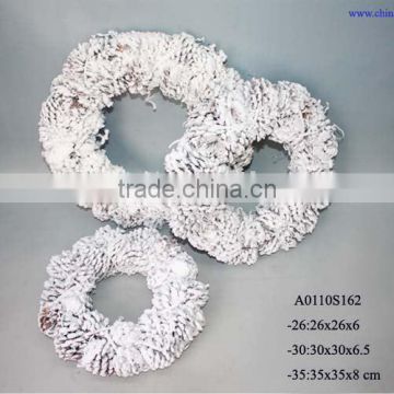 pine cone christmas wreath with snow