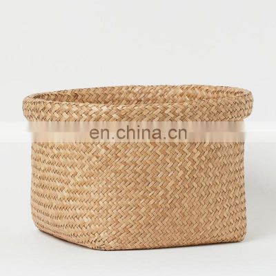 Hot Selling braided Seagrass Large storage basket with a turned-up rim Storage Laundry Basket Wholesale