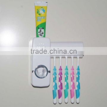 Wholesale children automatic toothpast dispenser toothbrush that dispenses with brush holder bathroom set