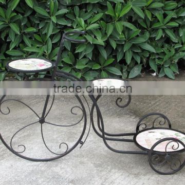 outdoor decorative bicycle shape antique rusty wrought iron flower pot stand. three pots stands