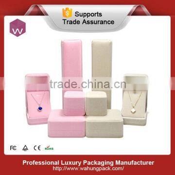 pink and beige PU leather jewel set box