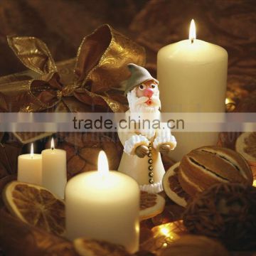 christmas man on canvas with Candle light