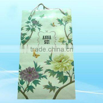 Beautiful flower paper clothing bag for shopping