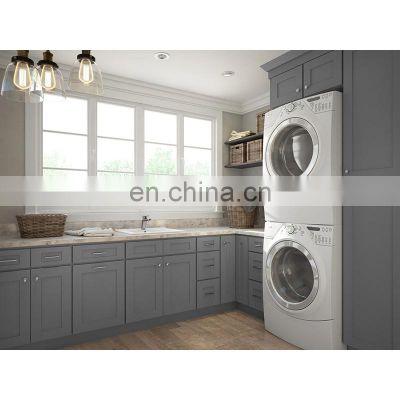 Custom grey shaker bathroom laundry room sink cabinet with washing machine