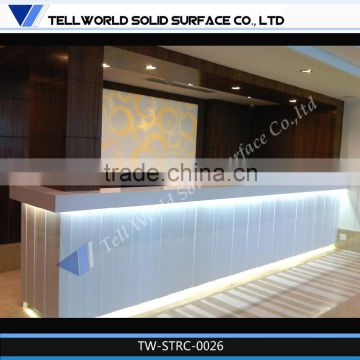 Solid surface simple outside led down lights decorated long modern reception counter
