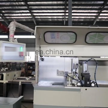 Automatic CNC saw for cutting aluminum extrusions