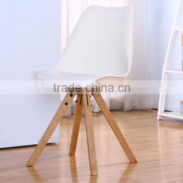 Molded plastic chair with beech wood legs
