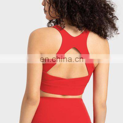 New Top Sell Sexy Back Hollow Out Soft Indoor Gym Yoga Wear Women Workout Fitness Sports Training Shockproof Bra Top Outfit