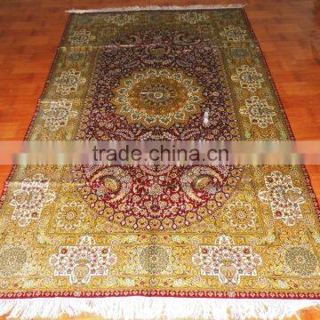 red and beige handmade silk iranian carpet for sale