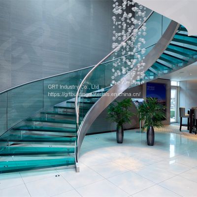 Arc / curved staircase with blue glass steps stainless steel stringer glass stair