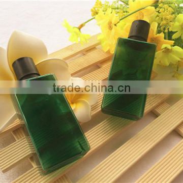Green rectangle lotion bottle with screw cap
