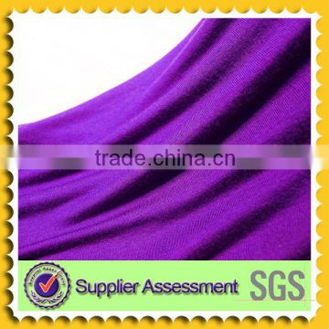 Purple dyed polyester rayon spandex fabric