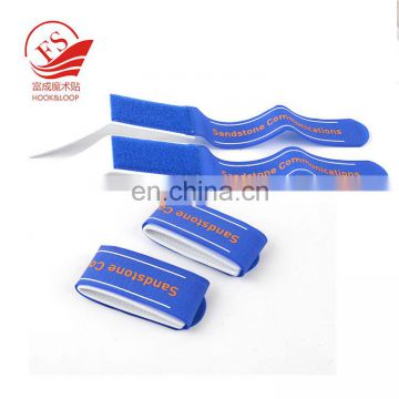 Durable hook and loop ski strap pair EVA protector pads between skis