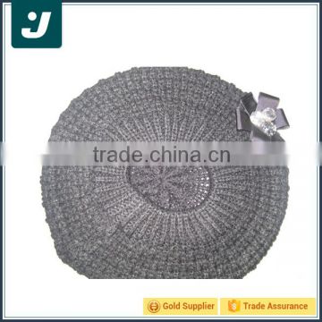 Fashionable gray knitted beret with rhinestone flower