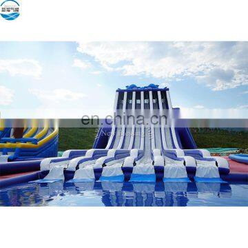 Factory manufacture crazy 6 lanes high waterfront park inflatable giant slide