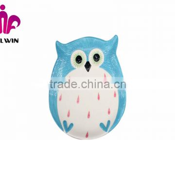 Heat printing on ceramic plates with owl design