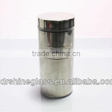 glass storage jar with iron cover
