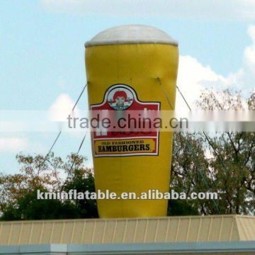 Giant inflatable cup on roof