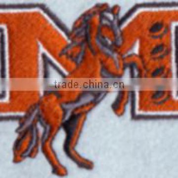 Fashionble horse embroidery patch with iron on garment backing .