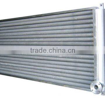 Waste heat recovery exchanger with carbon steel tube and aluminum fins