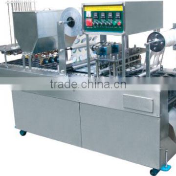 Ice cream cup filling and sealing machine
