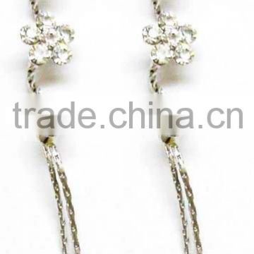 Fashion earring with bend shaped strio and two stones on end