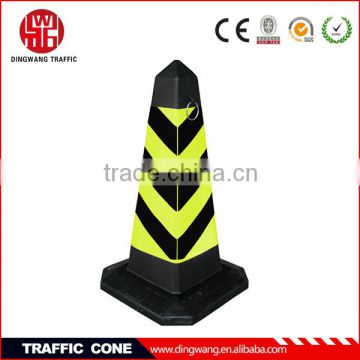 Yellow and black plastic traffic cones