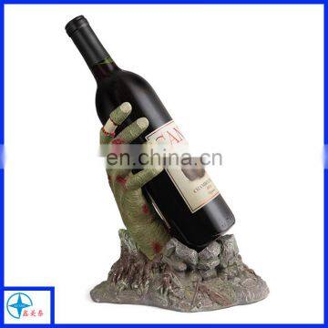 Novelty Halloween style decorative resin bloody zombie hand holding a bottle wine rack