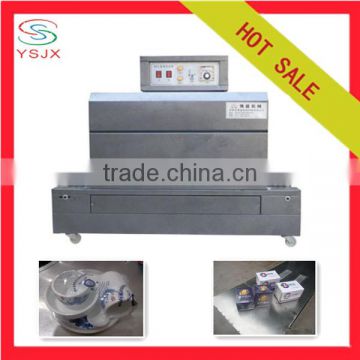 Hot Small Heat Shrinking Tunnel Packing Machine With Chain