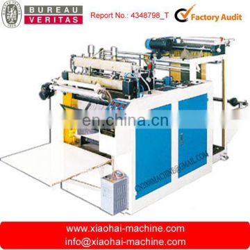 Heat sealing and cold cutting heavy duty bag making machine
