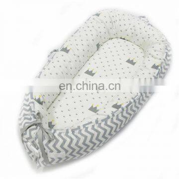 Comfortable snuggle baby nest pillow bed for infant and baby
