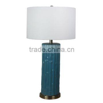 Best selling decorative morden polyresin handicrafts table lamp made in china with linen lamp shade and UL CE RoHS SAA standard
