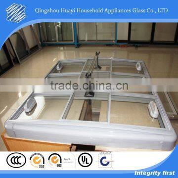 Bent small radius curved tempered laminated glass lids for island cabinet