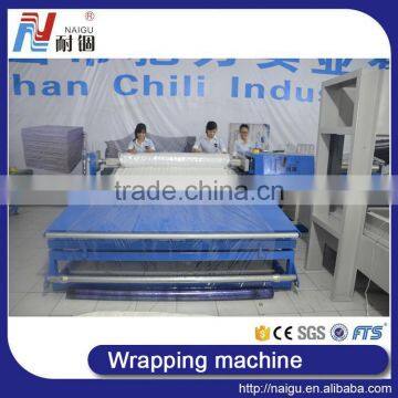 China Foshan NaiGu manufacturer semi-automatic mattress roll packing machine