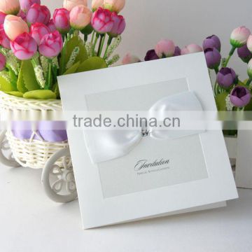 factory price high quality custom white pocket wedding invitation greeting card with ribbon                        
                                                                                Supplier's Choice